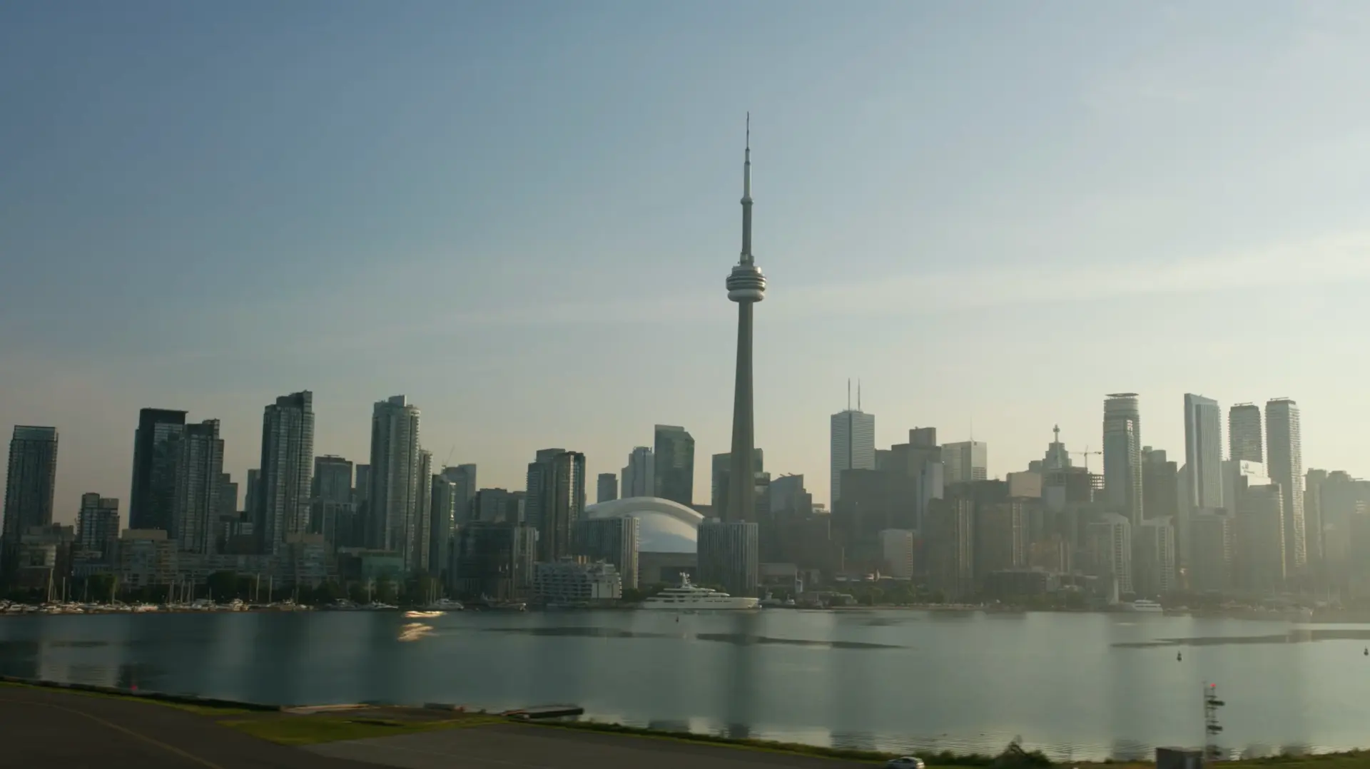 Toronto skyline from the harbour — one of the series' production markets.